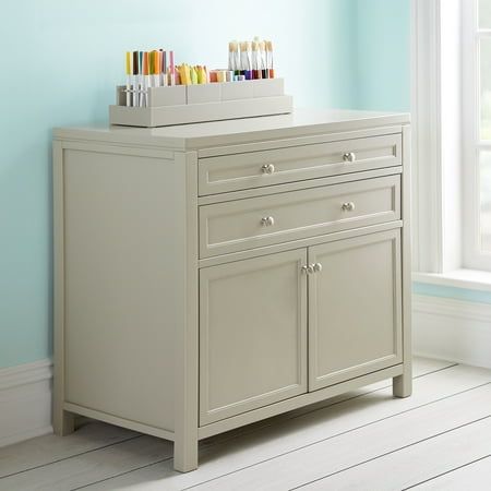 Comprised of unique storage solutions, functional work spaces and special places to curate and display children's art, the Martha Stewart Crafting Kids' Collection by Guidecraft inspires a child's artistic expression. Innovative designs along with quality pieces, together establish a comprehensive, child-centered space to create using a variety of media. Constructed from a durable combination of easy-to-clean solid pine and engineered wood, the Kids' Artwork Storage - Gray calms the chaos of any Ikea Kids Art Station, Art Supply Cabinet, Kids Art Room Organization, Kids Art Organization, Home Office And Craft Room Combo, Kids Craft Desk, Martha Stewart Craft Furniture, Cluttered Art, Kids Artwork Storage