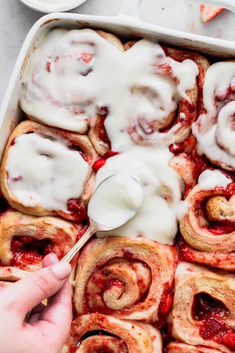 These sweet strawberry rolls are super gooey rolls that taste like strawberries and creamy. It is filled with a strawberry filling and strawberry preserves. The rolls are topped with cream cheese glaze. These are perfect to make for brunch! Strawberries And Cream Rolls, Strawberry Preserves Desserts, Strawberry Rolls With Cream Cheese Icing, Strawberry Cheesecake Rolls, Strawberry Sweet Rolls, Strawberry Rolls, Nut Dessert, Strawberry Sugar, Strawberry Cream Cheese Frosting