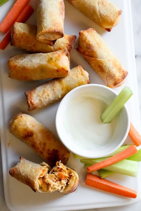 These Buffalo Chicken Egg Rolls, filled with shredded boneless chicken breast, carrots, scallions, hot sauce and blue cheese make the perfect appetizer! Bake them in the oven or air fryer! Buffalo Chicken Egg Rolls, Chicken Egg Rolls, Pre Cooked Chicken, Egg Roll Recipes, Chicken Dip, Eat Seasonal, Bowl Recipes, Buffalo Chicken Dip, Skinny Taste Recipes