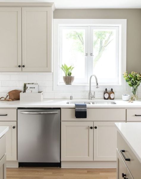 Light Cabinets Kitchen Dark Counters, Greige Walls White Cabinets, White Tan Kitchen Ideas, Light Painted Cabinets Kitchen, French Vanilla Kitchen Cabinets, Modern Beige Kitchen Cabinets, Cabinet Colors With Accessible Beige Walls, Kitchen Colors For Walls White Cabinets, Icy Avalanche Cabinets