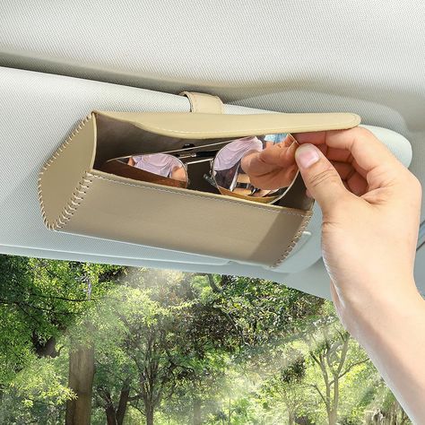 Complete your travel goals with our Sunglasses Holder for Car Sun Visor – the ultimate travel essential to keep your shades handy and your journey stylish. Types Of Sunglasses, Leather Eyeglass Cases, Car Sun Visor, Sunglasses Storage, Visor Sunglasses, Car Visor, Sunglasses Holder, Storage Bags Organization, نظارات شمسية