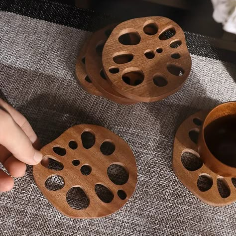 Elevate your home decor with our Lotus Root Wooden Coasters. Crafted with quality wood, each coaster has a unique lotus root shape that adds a touch of Japanese elegance to your table. Protect your furniture with style. • Wood • Drink Coaster • Eco-Friendly • 3.7" x 3.3" (9.5 x 8.5cm) Kitchen Cartoon, Japanese Lotus, Wood Jewelry Diy, Bar Cups, Modular Desk, Wood Company, Lotus Root, Home Ware, Wood Items