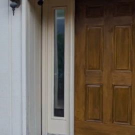 Chelsea on Instagram: "The finale look of my front door makeover. I'm really happy with how this turns out. How I achieved this faux wood look: I started with a base coat in a creamy yellow. Then I applied two coats of Varathane gel stain in the color golden oak. Make sure to let the first coat dry completely before applying the next. It's such a big transformation and so satisfying! I'll be working on the garage doors next, you don't want to miss it. #fauxwood #fauxwooddoor #frontdoor #frontdoormakeover #beforeandafterhome #entrydoor #doorproject #homediy #diyhomeprojects" Stained Front Door, Front Door Makeover, Front Door Colors, So Satisfying, Gel Stain, Golden Oak, Door Makeover, Door Color, The Garage