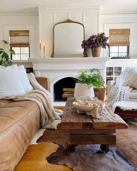 White Living Room Leather Couch, Coffee Table In Front Of Fireplace, White Fireplace Mantle Ideas, Leather Couch Cottage Style, Styling A Leather Couch, Coffee Table With Leather Couch, Cozy Leather Couch Living Rooms, Brown Leather Couch Living Room Ideas, Leather Couch Styling