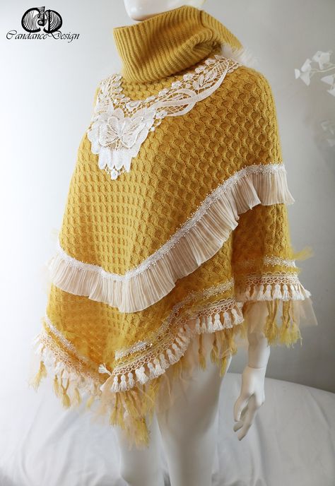 Eye-catching upcycling poncho in a structured knit in yellow and with a loose turtleneck. The front of the poncho is decorated with floral, white embroidery. A white chiffon border runs all around, as well as golden and apricot-colored tulle, a winter border and a fringe border. White tulle ruffles are sewn on the shoulders. The white embroidery and trims give the yellow poncho a feminine elegance and playfulness. Can be worn from size S to M/L. Cape Cloak, Pink Cloud, Ladies Poncho, White Tulle, White Chiffon, Amazing Ideas, Crochet Poncho, Shawl Pattern, Knitted Poncho