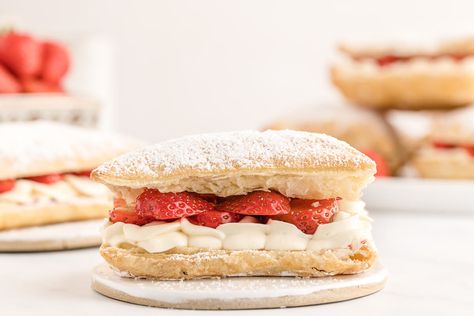 Indulge in the heavenly layers of a Strawberry Napoleon, a delectable mille-feuille dessert with flaky strawberry puff pastry. Elevate your dessert game with this elegant Napoleon Dessert featuring luscious strawberries. Discover the recipe and variations for this classic treat that will leave you craving more. Perfect for special occasions or a sweet indulgence. Pin it now and enjoy the ultimate strawberry delight! The ultimate French dessert. Strawberry Napoleon, Napoleon Dessert, Strawberry Puff Pastry, Napoleon Cake, Puff Pastry Cream Puffs, Strawberry Delight, Yummy Mummy, French Dessert, Frozen Puff Pastry