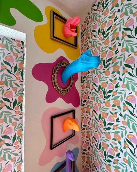 Many of Kaarin's designs and ideas have gone viral on <a href="https://www.instagram.com/kaarinjoy">Instagram</a> and <a href="https://www.tiktok.com/@kaarinjoy">Tiktok</a>, like this dinosaur head wall. Credit: <a href="https://www.instagram.com/kaarinjoy/">Kaarin Joy</a> Creativity Wall Art, Wacky Living Room, Playful Home Design, Art Room Wall Decor, Eclectic Wall Painting Ideas, Eclectic Wall Decor Ideas, Art How Aesthetic, Wierd Home Decor, Cool Art Project Ideas