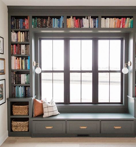 Built-In Bookshelf Frames Double-Hung Windows in Reading Nook | Pella Oakstone Homes, Window Seat Design, Office Entry, Home Library Design, Home Library, Window Seat, Home Office Design, Front Room, Design Case