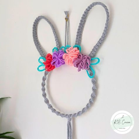 Looking to add a touch of Easter charm to your home décor? Look no further than this delightful indoor Easter wreath featuring vibrant spring-coloured florals. Paired with a macrame bunny wall hanging, this combination is sure to bring a whimsical and inviting feel to any room in your home. The rabbit décor is not just limited to Easter celebrations; it can also be a sweet addition to a bunny-loving child's bedroom or nursery. Imagine the joy on your little one's face as they wake up to this ... Rabbit Decor, Easter Wreath, Easter Celebration, The Rabbit, Easter Wreaths, Spring Colors, Wake Up, Macrame, Wreath