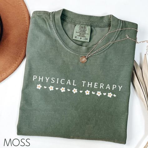 Designed with love for the women who loves Physical Therapist letter design shirt. 🧵 Product Description Comfort Colors introduces the "Comfort Colors 1717" garment-dyed t-shirt; a fully customizable tee made 100% with ring-spun cotton. The soft-washed, garment-dyed fabric brings extra coziness to your wardrobe while the relaxed fit makes it an excellent daily choice. The double-needle stitching throughout the tee makes it highly durable while the lack of side-seams helps the shirt retain its tubular shape. Discover all 58 colors in our Comfort Colors 1717 color charts below. .: The Comfort Colors 1717 tee is made with medium fabric (6.1 oz/yd² (206.8 g/m consisting of high quality, 100% ring-spun US cotton for long-lasting comfort. .: The relaxed fit keeps the wearer comfy in both casual Physical Therapy Shirts, Therapist Humor, Therapy Shirt, Papa Shirts, Therapy Gift, Therapist Gifts, All Good Things, Grad Gifts, Oversized Look