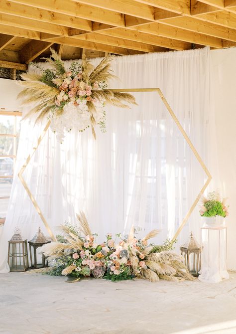 Heksagon Wedding, Hexagon Ceremony Backdrop, Wedding Arches Hexagon, Hexagon Arch, Polygon Gallery Wedding, Hexagon Wedding Arch, Hexagon Wedding Arch White Flowers, Hexagon Wedding Arch Pampas, Hexagon Wedding Arch With Neon Sign