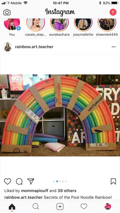 Paper Rainbow Wall Decor, Giant Rainbow Decoration, Rainbow Pool Noodles Diy, Daycare Entryway Ideas, Pool Noodle Rainbow, Kids Room Rainbow, Hay Bale Art, Magic Of Oz, Rainbow Diy