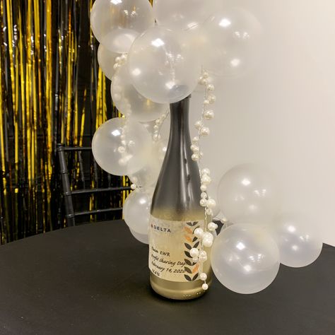 Champagne Party Centerpieces, Champagne Bottle Centerpiece Ideas, Champagne Bottle Centerpiece, Champagne Centerpiece Ideas, Champagne Centerpiece, Wine Bottle Centerpieces, 21st Bday Ideas, Bottle Centerpieces, Gold Party Decorations