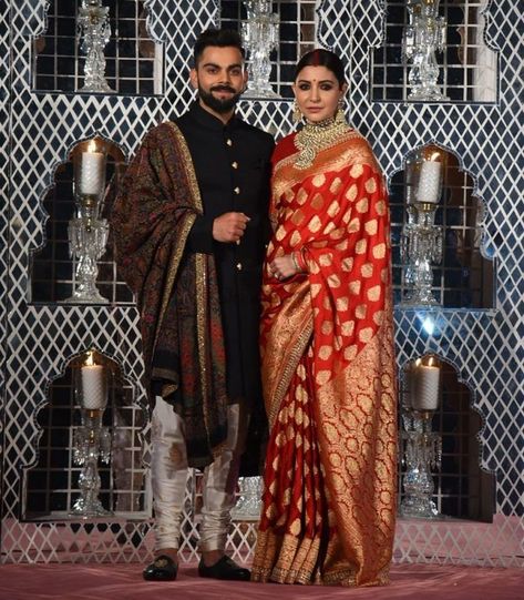 Anushka Sharma's Benarasi saree with elaborate motifs. #silksaree #shaadisaga #bridalinspiration #saree #bride #bridalsaree #weddinginspo #traditionalsaree Reception Sarees, Anushka Sharma And Virat, Virat Kohli And Anushka, Virat And Anushka, Reception Saree, Indian Groom Wear, Reception Outfit, Anushka Sharma, Indian Wedding Outfits