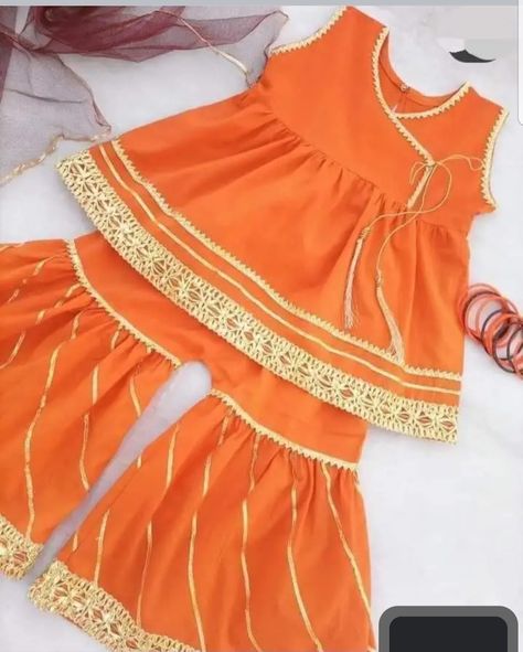 Short frock & gharar style dress # stylish dressing design ideas for home mummy tailer / Gottha anraka style frock Dressing Design Ideas, Angrakha Style Frock, Baby Girl Fancy Dress, Angrakha Style Kurti, Simple Shirt Design, Shadi Dress, Kid Dresses, Baby Stitch, Frocks For Kids