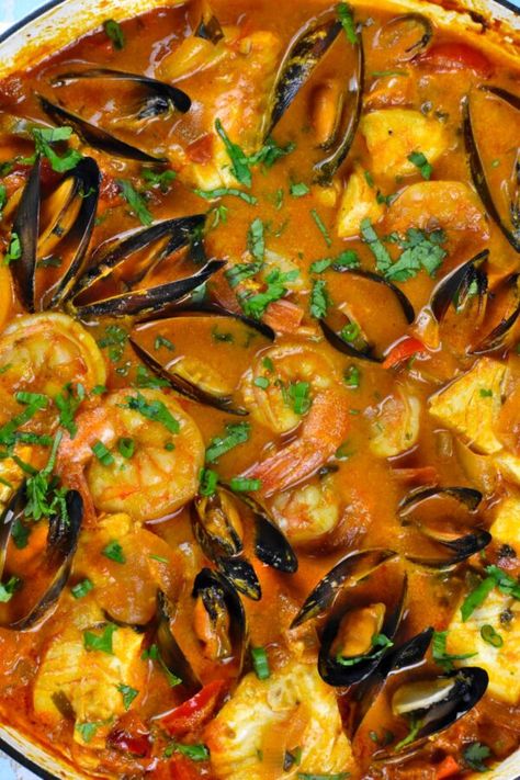 Moqueca (Brazilian Seafood Stew) - GypsyPlate Brazilian Dishes, South American Recipes, Seafood Stew, Seafood Soup, Sauteed Veggies, Brazilian Food, Portuguese Recipes, Food Goals, Fish Dishes