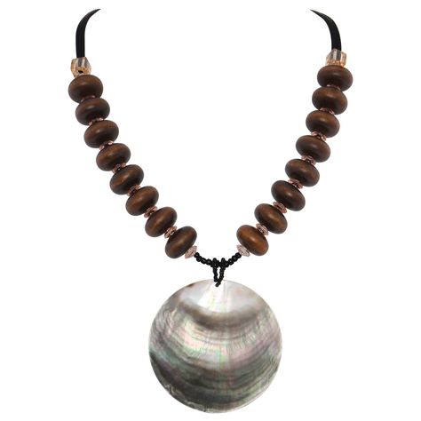 PRICES MAY VARY. Material: Wood,Big Shell,Acrylic,Rope Cord. Size:Necklace length , Beads, Adjustable Rope Cord. Safe and Sturdy: odorless,solid wood,safe to wear,sturdy and not easy to break. Fashionable Design:The classic and simple wooden necklace is suitable for all occasions and makes you look more charming, a perfect gift for birthday, Christmas, Father's Day, Valentine's Day, anniversary, etc. More Choices: This will get you lots of compliments. We have more styles in our store, such as s Wooden Beaded Necklace, Cheap Brown Wooden Beaded Necklaces, Wooden Jewellery, Large Wood Bead Necklace, Brown Wooden Necklace With Large Beads, Brown Wooden Beads Pendant Necklace, Adjustable Multi-strand Wooden Beads Necklaces, Wooden Bead Jewelry, Beaded Collar Necklace