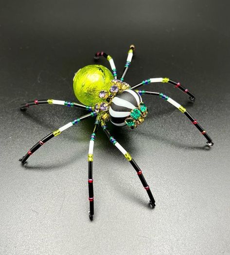 JL Ennui on Instagram: "This reminded me of Bettlejuice, you know, if Beetlejuice was a fancy girl spider. All that aside, it’s almost spooky season! 🎃👻 #glass #glassbeads #oklahoma #okc #madeinok #glasssart #beads #bead #beaded #spider #spiders #animalart#bug #bugs #spidersofinstagram beadwork #beading #creepy #creepyart #creepycute #whimsical #wire #creative #oddities #gothaesthetic #witchyvibes #beetlejuice" Goth Aesthetic, Creepy Art, Witchy Vibes, Creepy Cute, Beetlejuice, Spiders, Spooky Season, Oklahoma, Animal Art