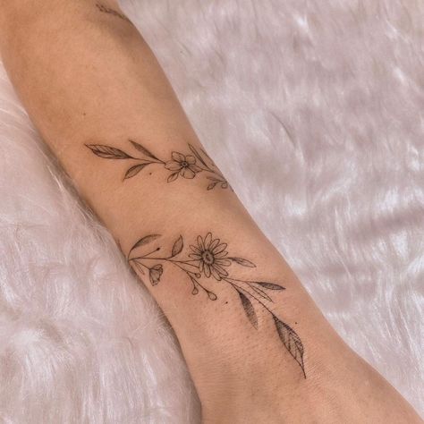 Floral Vine Wrist Tattoos For Women, Wrap Around Sunflower Wrist Tattoos, Dainty Forearm Wrap Around Tattoo, Sunflower Tattoo With Vines, Vine Tattoo With Sunflower, Sunflower Vines Tattoo, Sunflower Arm Wrap Tattoo, Sunflower Wrap Tattoo, Botanical Wrist Wrap Tattoo