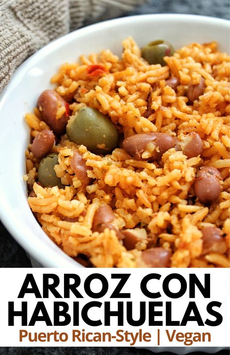 Pueto Rican yellow rice with pink beans made with sofrito, tomato sauce, and seasoning.