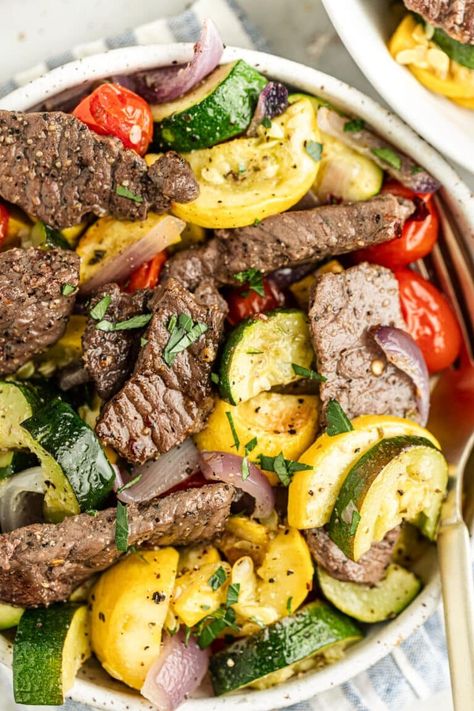 This dinner of steak, zucchini, squash, onion, and tomatoes roasts on one pan. It's so easy and yummy! Plus it's dairy free, gluten free, & Whole30! Herb Crusted Salmon, Italian Potatoes, Low Fat Dinner, Shrimp And Broccoli, Garlic Green Beans, Marinated Steak, Creamy Mashed Potatoes, How To Cook Sausage, Chicken Cutlets