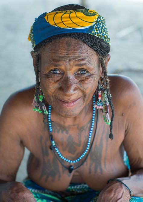 Benin, West Africa, Gossoue, an old tattooed fulani peul t… | Flickr Fulani Tattoo, Tribe Tattoo, Eric Lafforgue, Old Tattoos, Woman Portrait, West Africa, Female Portrait, Tatting, Hair Wrap