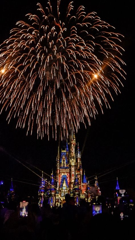 Cinderella Castle in Magic Kingdom, lit up in red blue and gold projections with a giant firework in full bloom, exploding over top of it Magic Kingdom Fireworks, Disney Prom, Firework Show, Disney Poses, Enchanted Kingdom, Disney 2024, Disney World Florida, The Enchantments, Fireworks Show