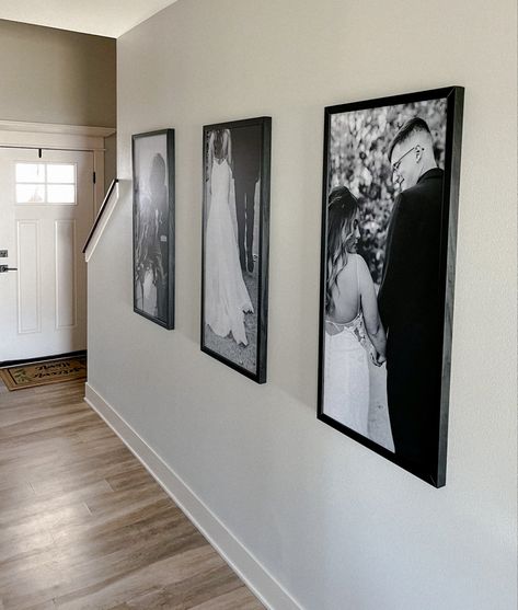 Hallway Canvas Display, Family Pictures In Hallway, Big Frames On Wall Family Photos, Maternity Photo Wall Display, Hallway Wedding Photos, Long Hallway Picture Display, Wedding Pictures Display At Home, Hallway Picture Display, Hallway Photo Gallery