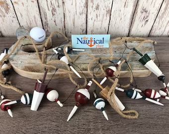 Wine cork fishing bobber | Etsy Fishing Room Decor, Fishing Net Wall Decor, Buoy Decor, Fishing Bobbers, Rope Garland, Surf House Decor, Nautical Crafts, Fishing Bobber, Fishing Floats