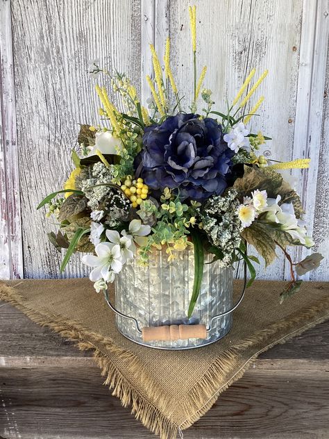 Year Round Floral arrangement from my #etsy shop: Copper Rimmed Galvanized Tin Blue and Yellow Floral Arrangement~Farmhouse Summer Floral Arrangement~Rustic Floral Centerpiece Ffa Floral Arrangements, White And Blue Flower Arrangements, Thanksgiving Floral Arrangements, Blue Flower Arrangements, White And Yellow Flowers, Table Floral Arrangements, Thanksgiving Floral, Blue Peony, Blue Centerpieces