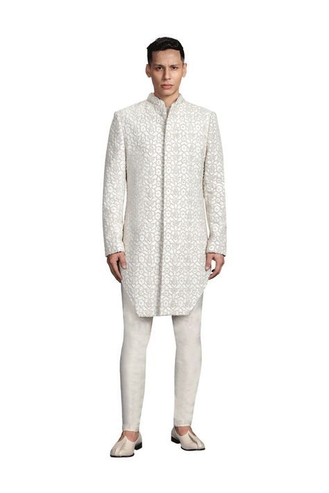 Double Geometric Knotted Pattern Sharp Bucket Cut, Concealed Placket Styled With Vanilla Silk Kurta & Corded Breeches Color: Vanilla Fabric: Suiting Wash Care: Dry Clean Only Delivery Time: 40-45 Days Kunal Rawal Menswear, Indo Western Dress For Men, Pakistani Kurta Designs, Kunal Rawal, Pakistani Kurta, Sherwani Groom, Sherwani For Men, Indo Western Dress, Suit Pant