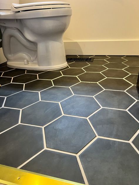 dark hexagon tile with light colored grout in small bathroom Black Hexagon Tile Bathroom Floor Ideas, Small Black Hexagon Tile Bathroom Floor, Gray Hexagon Tile Bathroom Floor Dark Grout, Black Hexagon Tile Bathroom Floor, Marble Hexagon Tile Bathroom, Bathroom Remodel Black Hexagon Tile, Black Hexagon Tile Floor, Honeycomb Tiles Bathroom, Modern Farmhouse Bathroom Black Hexagon Tile