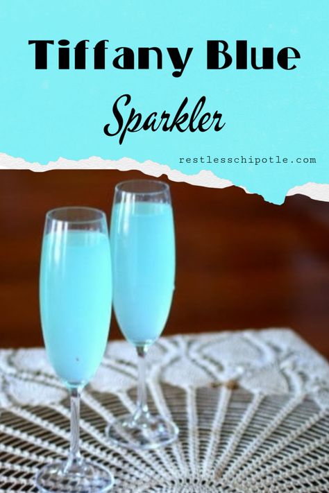 Pretty, sparkly Tiffany Blue Cocktail is similar to a blue mimosa. It's perfect for bridal showers, Mother's Day, Easter, or anytime you want a light, pretty drink to serve.  #recipe #wedding #drinks #easy #mimosa #babyshower #party #withoutcuracao #mothersday #valentinesday #blue #Hypnotiq Hypnotiq Drinks Recipes, Tiffany Blue Cocktail Drink Recipes, Light Blue Drinks Alcohol, Tiffany Blue Mimosa, Light Blue Alcoholic Drink, Something Blue Drink, Tiffany Mimosa Recipe, Blue Mimosa Bar, Something Blue Cocktail