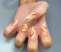 https://encrypted-tbn0.gstatic.com/images?q=tbn:ANd9GcTI0umc1BGmrpcGi38osBuUUpR1MkydnDKWKw&usqp=CAU Yellow Nails With Heart, Yellow Orange Nails Acrylic, 70s Themed Acrylic Nails, 70s Disco Inspired Nails, Yellow And Orange Nails Summer, 70s Disco Nail Designs, Heart Design Nails Acrylic, 70s Themed Nails, 70s Theme Nails