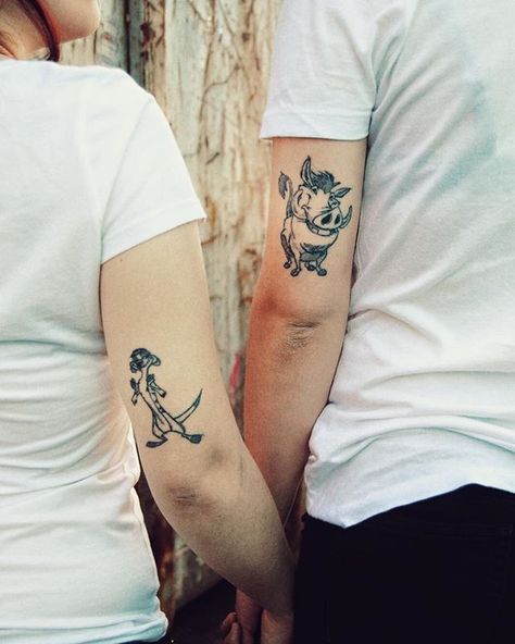 Timon & Pumba couple tattoo by @standupeight Pumba Tattoo, Disney Couple Tattoos, Best Friend Tattoo, Couple Tattoos Love, Couple Tattoos Unique Meaningful, Couple Tattoos Unique, Timon And Pumbaa, Sibling Tattoos, Couple Tattoo