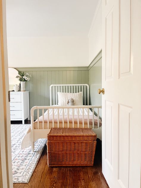 Kid bedroom, green paint, accent wall, ship lap, neutral room, girls room, traditional home decor, white bed, spindle bed, wicker truck, texture, color, pattern, home decor inspo, white dresser, evergreen dog, modern traditonal, studio Mcgee, Joanna Gaines, magnolia home, Loloi, rifle paper company, pretty rug, soft rug, gold mirror Follow my shop @craneandhome on the @shop.LTK app to shop this post and get my exclusive app-only content! #liketkit #LTKhome #LTKfindsunder100 #LTKkids @shop.ltk https://liketk.it/4n0cr Green Paint Accent Wall, Bedroom Green Paint, Paint Accent Wall, White Toddler Bed, Gold Bed Frame, Green Girls Rooms, Loloi Rug, Joanna Gaines Magnolia, Kids Bed Frames