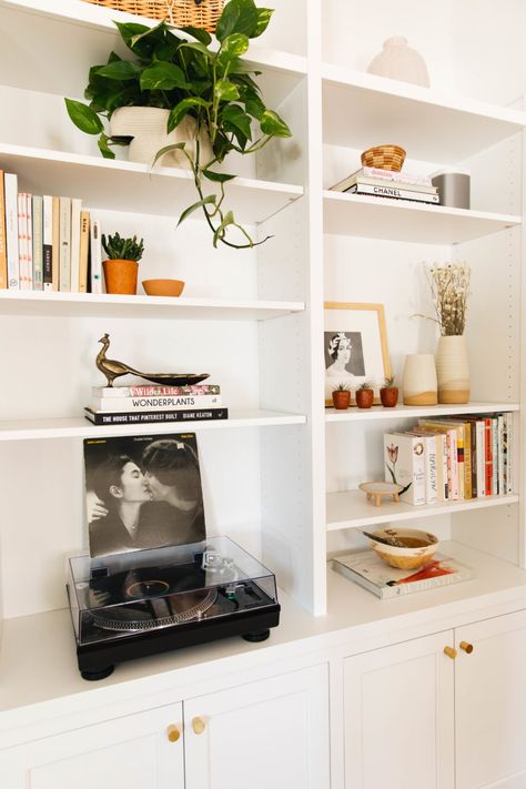 Bookcase with Record Player Built In Wall Storage Living Room, Record Player Shelves, Built In Bookcase Styling, Record Player Shelf Wall, Built In Record Shelves, Built In Shelves Behind Couch, Built In Record Storage, Record Player On Bookshelf, Record Player Bookshelf