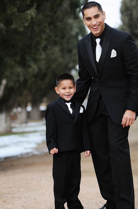 Black And White Ring Bearer Attire, All Black Tux With White Bow Tie, All Black Suit White Tie, Groom Attire Black And White, Groom Suit Black And White, Black Tux White Tie, Black On Black Tux, Black Suit White Tie, Ring Bearer Outfit Black