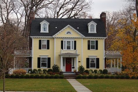 Yellow House- Love the color combo House With Yellow Siding, Yellow House Exterior With Shutters, Burgundy Door, Navy Shutters, Yellow House Exterior, Yellow Exterior, French Country Exterior, Black Roof, Black Shutters