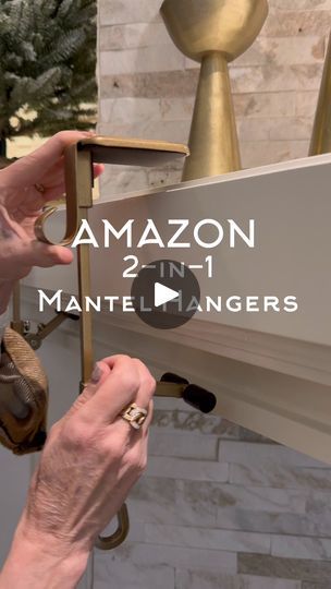 6.5K views · 65 reactions | https://urlgeni.us/amzn/Mantelhangers 🎄These heavy duty 2-in-1 garland and stocking hangers are amazing! Adjust to nearly any size mantel. With no hardware or damage to your mantel and secure easily in place. Each hook holds up to 20 lbs and makes creating the perfect mantel effortless every time. #amazonhome #garland #christmasdecor #christmashacks #manteldecor | The Design Twins Hanging Stockings On Mantel, Pallet Fireplace, Diy Mantle, Garland Hanger, Stocking Hangers, Holiday Finds, Fireplace Garland, Mantle Garland, Christmas Delights