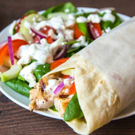 Chicken Souvlaki | A lunchbox classic made from leftover chicken meat and lashings of homemade tzatziki Chicken Souvlaki Wrap, Souvlaki Wrap, Spicy Chicken Wrap, Cucumber Dressing, Chicken Souvlaki, Homemade Tzatziki, Wrap Recipe, Crunchy Salad, Creamy Cucumbers