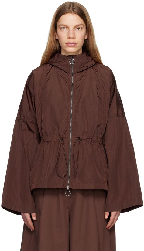 Lightweight water-repellent nylon ripstop jacket. · Hood at stand collar · Two-way zip closure · Gathering at waist · Bungee-style drawstrings at waist · Seam pockets · Unlined Supplier color: Chestnut Winter Styling, Drawstring Jacket, Sports Wear Women, Studio Nicholson, Women Sports, Sports Wear, Styling Ideas, Sport Wear, Lightweight Jacket