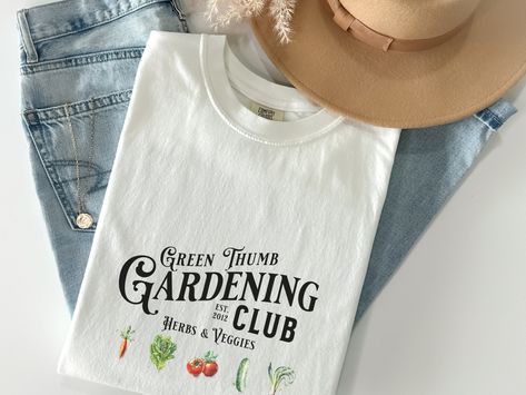 Garden Shirt, Garden Shirt for Women, Garden Club, Plant lady, Plant Lover, Gift for Gardener, Gift for Planter by HowellApparelDesigns on Etsy Gardening Shirt, Green T-shirt For Gardening In Summer, Gardening Tshirt, Cotton T-shirt For Gardening In Summer, Groovy Tees, Cotton T-shirt With Graphic Print For Gardening, Pregnancy Reveal Shirt, Bridal Shirts, Chicken Shirts