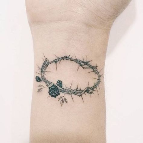 Meaningful Christian Tattoo Ideas for Women Crown Of Thorns Tattoo Women, Crown Of Thorns Tattoo, Faith Tattoo Designs, Thorns Tattoo, Crown Tattoos For Women, Thorn Tattoo, Thistle Tattoo, Christian Tattoo, Tiny Wrist Tattoos