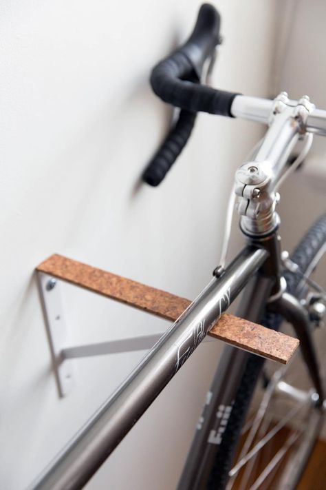 Shelf Brackets - New Creative Uses | Apartment Therapy Bike Storage Inside, Bike Storage Apartment, Diy Bike Rack, Indoor Bike Storage, Bike Shelf, Bike Storage Solutions, Bike Hooks, Bike Hanger, Bike Storage Rack