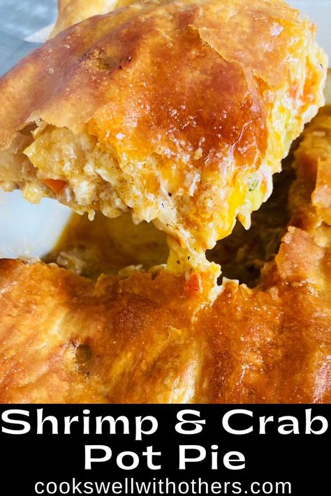 Seafood pot pie coming out of the casserole dish Shrimp Pie New Orleans, Louisiana Crab Pie, Charleston Shrimp Pie, Seafood Puff Pastry Recipes, Shrimp Pie Recipes, Southern Crab Pie, Seafood Pot Pie Puff Pastry, Crab Pies, Shrimp And Crab Recipes