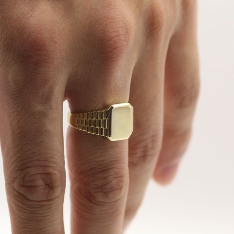 Gold Square Watch Style Men's Signet Ring. A modern take on a classic men's ring. Perfect for everyday wear or to add a touch of luxury to your outfit. #mensring #mensjewelry #signetring #goldring #squarering https://whispers-in-the-wind.com/discover-the-latest-mens-accessory-trends-for-2024/?silver-open-bracelet-for-men-maharani-charlottes-web-jewellery Men Pinky Ring Gold, Square Signet Ring Men, Mens Copper Jewelry, Mens Fine Jewelry, Vintage Signet Ring Men, Men’s Gold Rings, Old Money Accessories Men, Mens Jewelry Rings Gold, Gold Rings For Men Unique