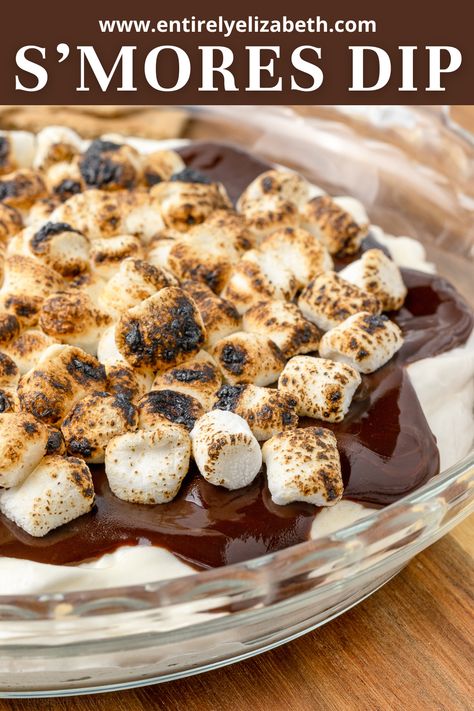 Experience s'mores in a whole new way with this irresistible S'mores Dip. Layers of marshmallow cream cheese, milk chocolate, and more toasty marshmallows make every bite unforgettable. Smores Dip Recipe, Smores Pie, Pie Dip, Milk Chocolate Ganache, Sweet Bar, Marshmallow Cream, Marshmallow Creme, Roasting Marshmallows, Savory Appetizer