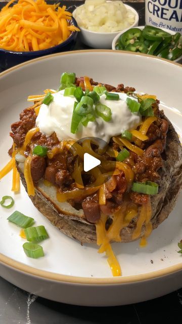 31K views · 2.1K likes | Carman Wilken on Instagram: "These Chili Cheese Baked Potatoes are so incredibly good and easy to make! And you get 4-8 servings for less than $15! #chili #cheese #bakedpotato #taters #easyrecipe #budgetmeal #potato #dinner" Baked Potato Chili Recipe, Chili And Baked Potato, Chili For Baked Potatoes, Baked Potato With Chili, Chili Over Baked Potato, Chili Cheese Baked Potato, Chili Baked Potato, Chili Bake, How To Make Chili