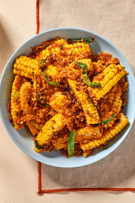 These corn ribs are great on their own, but even better with the garlicky-spicy-aromatic-electrifying crispy breadcrumb mixture on top. "Typhoon shelter-style” has become a technique that can be applied to a myriad of ingredients, from shellfish to vegetables and even fried rice. Different chefs prepare it differently as well. But the common denominator remains the sheer intensity of the dish: a whopping amount of minced and fried garlic, wok hei, and a deep, sustaining, fiery spice. Corn Ribs Recipe, Corn Ribs, Fried Garlic, Cantonese Cuisine, Wok Cooking, Common Denominator, Ribs Recipe, Cooking Seafood, Garlic Fries